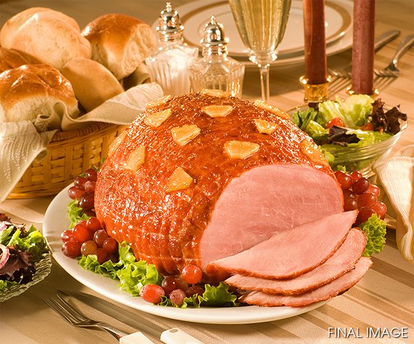 CLIENT :<br>Sahlen's<br><br>RETOUCHING INCLUDES:<br>1) Evening pink throughout ham end and slices<br>2) Remove holes and pits on surface of exposed ham<br>3) Fix areas where glaze had broken apart<br>4) Lighten salad greens<br>5) Lighten basket shadow area<br>6) Straighten tablecloth striping<br>7) Remove hot spot on glass