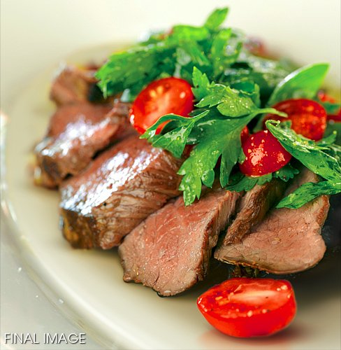 CLIENT :<br>The Penn Traffic Company<br><br>RETOUCHING INCLUDES:<br>1) Remove blood and pan drippings<br>2) Remove foremost seasoning debris<br>3) Make meat less pale and more appetizing<br>4) Enrich the greens and reds of the garnish